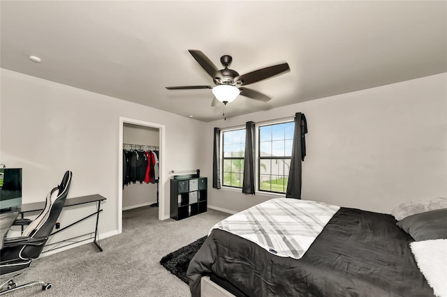 2352 Marton Oak Blvd, North Port, FL 34289 - carpeted bedroom featuring baseboards, a walk in closet, a closet, and ceiling fan