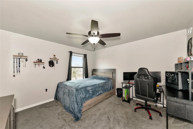 2352 Marton Oak Blvd, North Port, FL 34289 - carpeted bedroom with a desk, baseboards, and a ceiling fan