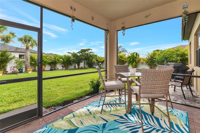 2352 Marton Oak Blvd, North Port, FL 34289 - sunroom / solarium featuring outdoor dining space