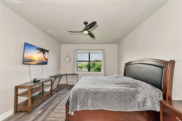 2352 Marton Oak Blvd, North Port, FL 34289 - bedroom featuring wood finished floors, baseboards, and ceiling fan