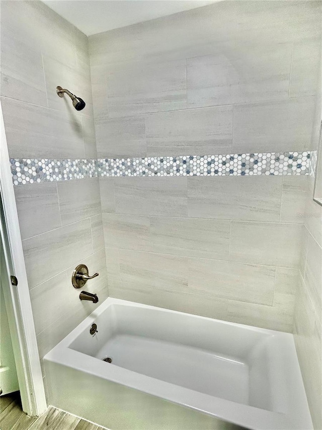 bathroom with shower / bathing tub combination