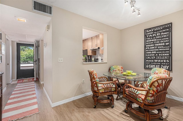 dining area featuring light hardwood / wood-style floors