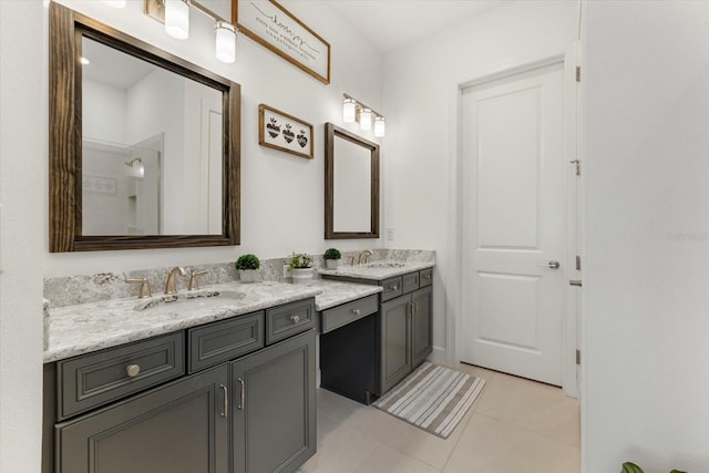 bathroom featuring tile patterned floors and vanity