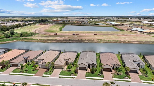 drone / aerial view with a water view