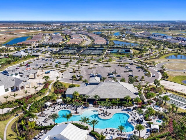 birds eye view of property featuring a water view