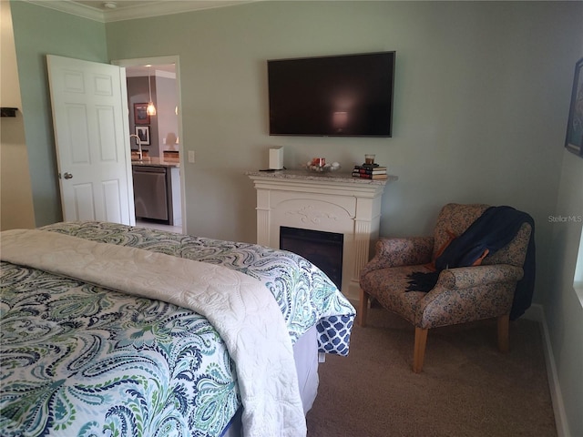 carpeted bedroom with ornamental molding