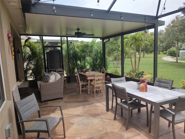 view of patio with ceiling fan and outdoor lounge area