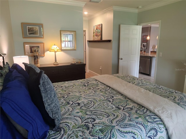 bedroom featuring crown molding