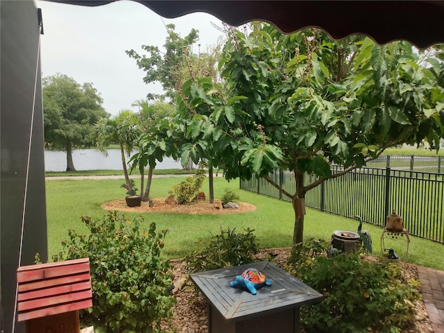 view of yard with a fire pit