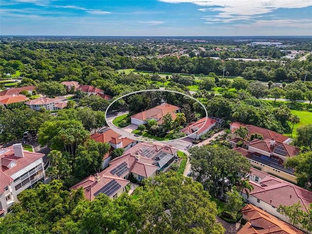 birds eye view of property with a residential view