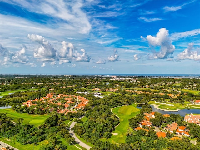 aerial view featuring a water view and golf course view