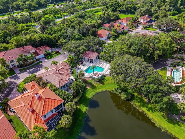 bird's eye view featuring a residential view and a water view