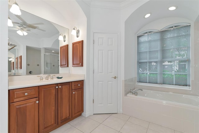 full bathroom with a garden tub, ceiling fan, tile patterned flooring, a shower stall, and crown molding