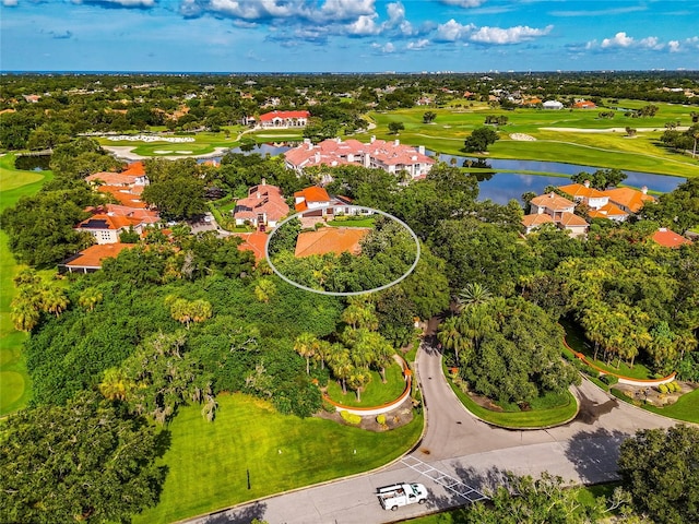 aerial view featuring a water view and golf course view