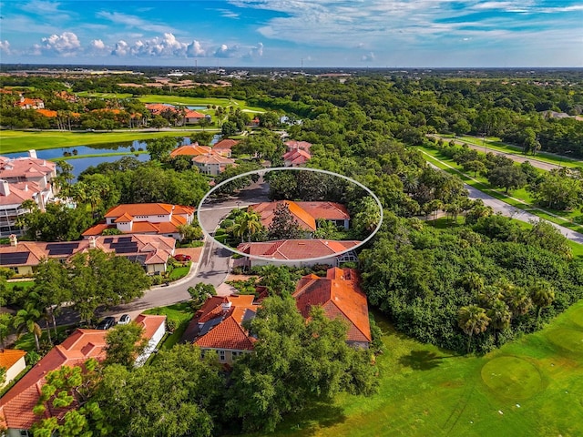 bird's eye view with a residential view and a water view