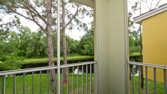 balcony featuring a water view