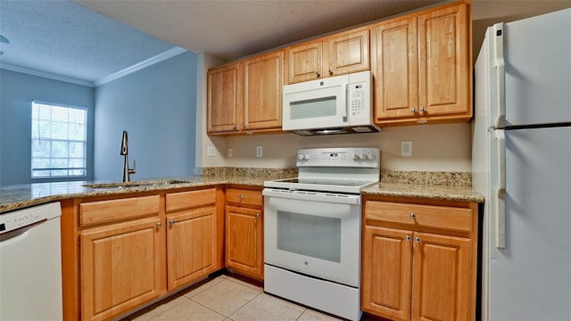 kitchen featuring sink, kitchen peninsula, white appliances, light tile patterned flooring, and ornamental molding