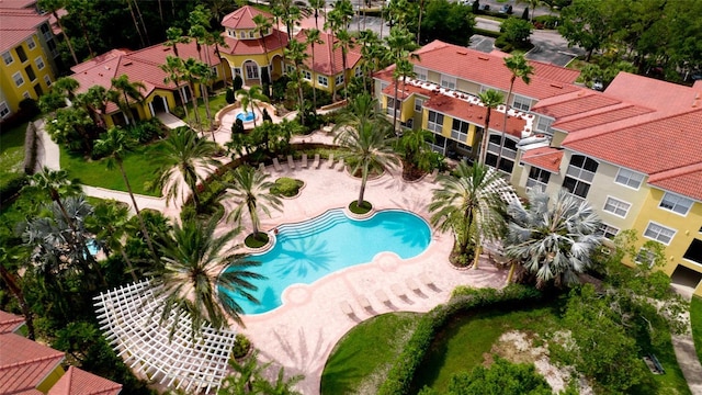 view of pool featuring a residential view