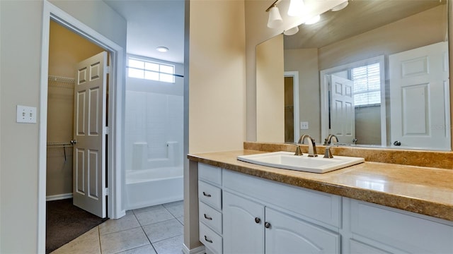 bathroom with vanity and tile patterned floors