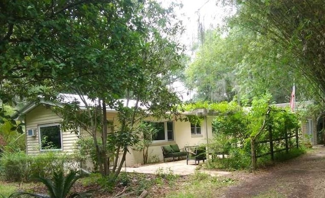 back of house with a patio area