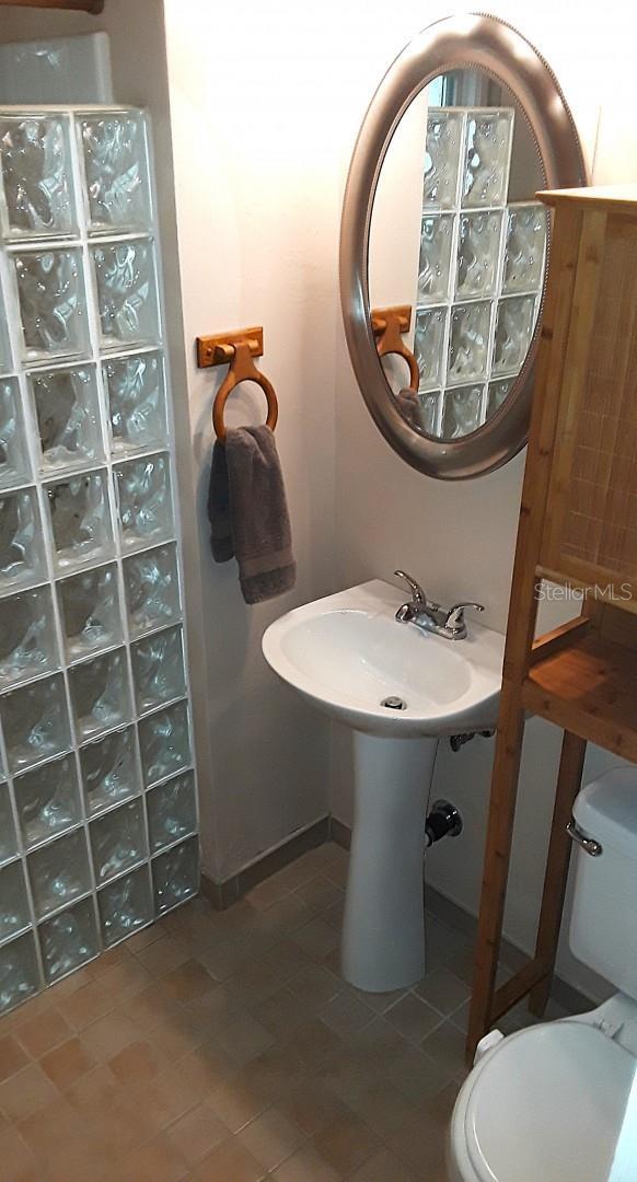 bathroom with a sink and toilet