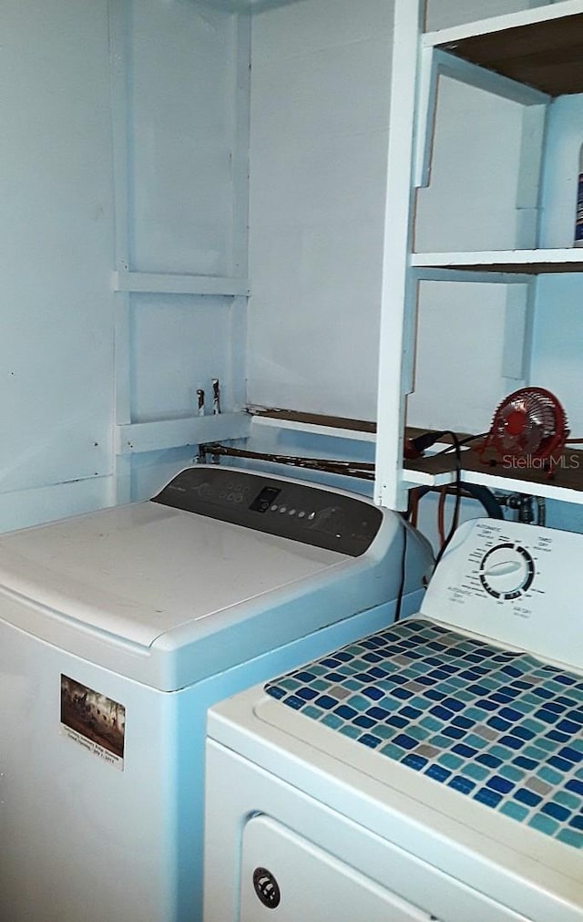 laundry area featuring independent washer and dryer