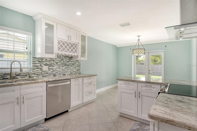 kitchen featuring sink, decorative light fixtures, dishwasher, decorative backsplash, and white cabinets