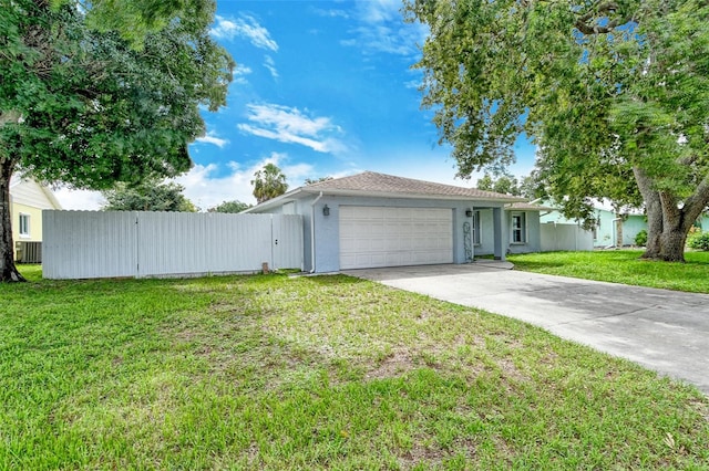 ranch-style house featuring a front lawn, central AC unit, and a garage