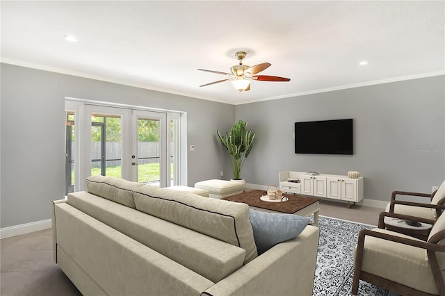 living room featuring ornamental molding, french doors, and ceiling fan