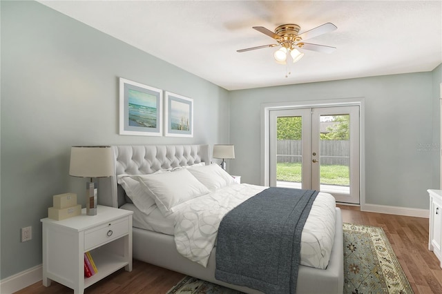 bedroom featuring dark wood-type flooring, access to exterior, ceiling fan, and french doors