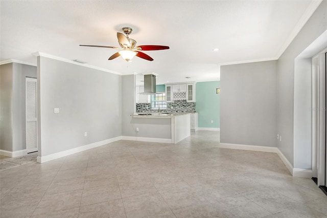 unfurnished living room featuring light tile patterned floors, ornamental molding, and ceiling fan