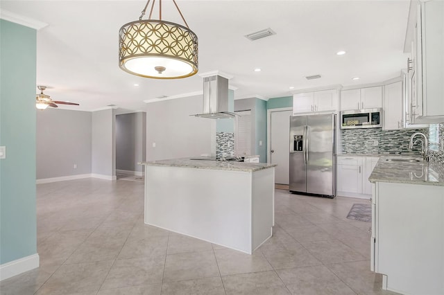 kitchen with white cabinetry, island exhaust hood, appliances with stainless steel finishes, and sink