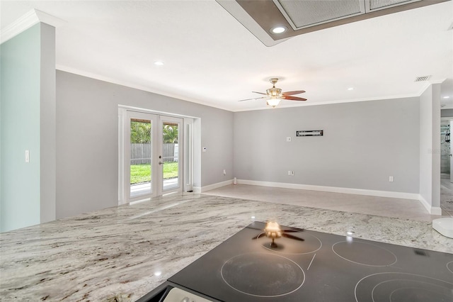 living room with ornamental molding, ceiling fan, and french doors