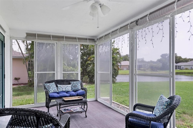 sunroom / solarium with ceiling fan