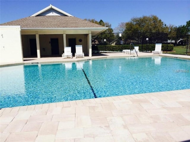 view of pool featuring a patio area