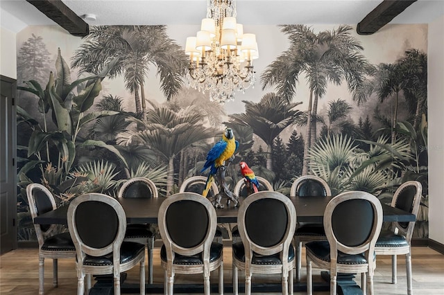 dining room featuring a notable chandelier and hardwood / wood-style flooring