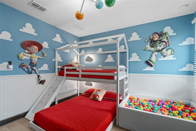 bedroom featuring a textured ceiling