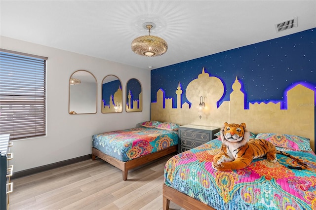 bedroom featuring light hardwood / wood-style flooring