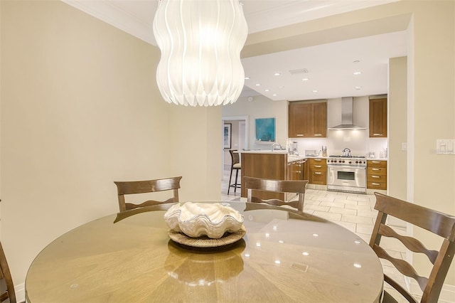 915 Seaside Drive 607, Weeks 14-15, Sarasota, FL 34242 - dining room featuring crown molding, light tile patterned flooring, recessed lighting, and a chandelier