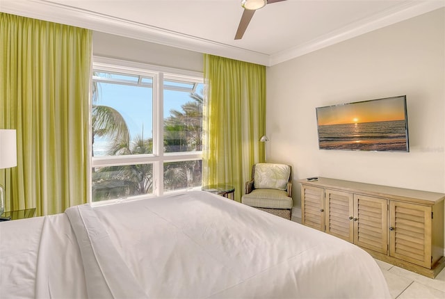 bedroom featuring light tile patterned flooring, ornamental molding, and ceiling fan