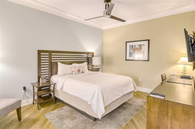 bedroom with ornamental molding, ceiling fan, and hardwood / wood-style floors