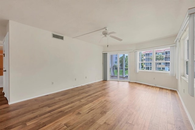 unfurnished room featuring wood-type flooring and ceiling fan