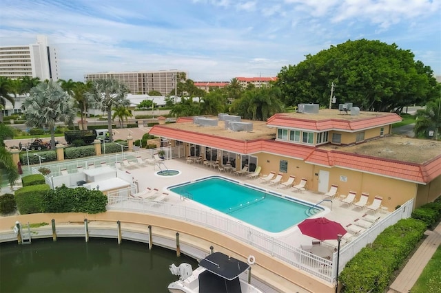 view of swimming pool with area for grilling and a patio area