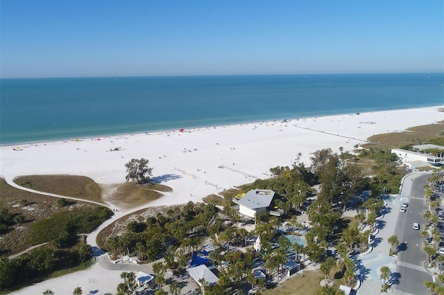 aerial view with a water view and a view of the beach