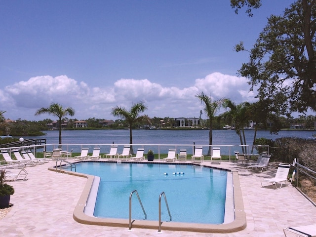 1300 N Portofino Dr Unit 208, Sarasota, FL 34242 - community pool featuring a water view