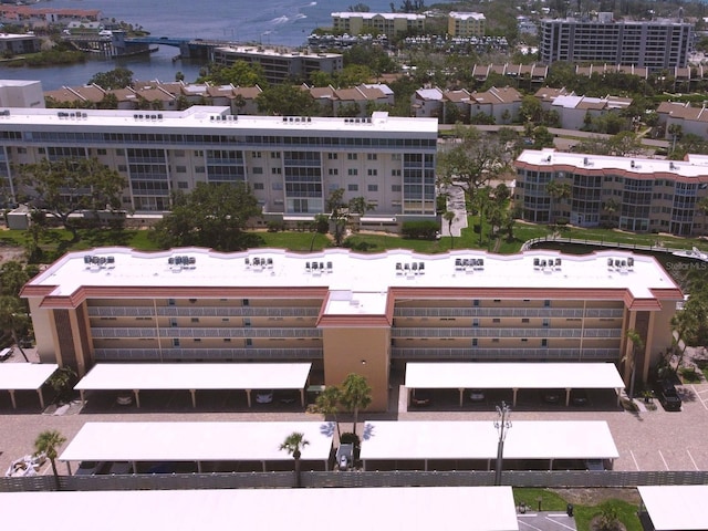 1300 N Portofino Dr Unit 208, Sarasota, FL 34242 - drone / aerial view of a nearby body of water and apartment complex / building