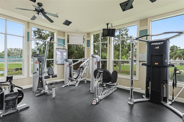 workout area featuring ceiling fan