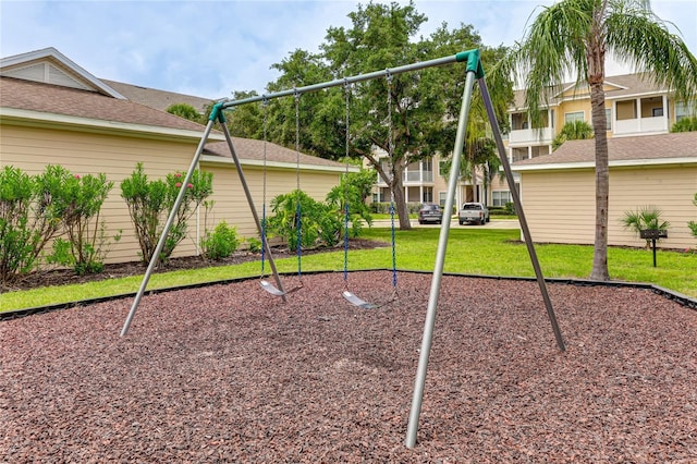 view of play area featuring a lawn