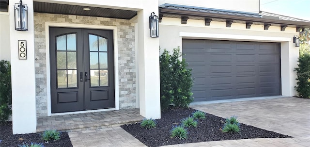 property entrance featuring french doors