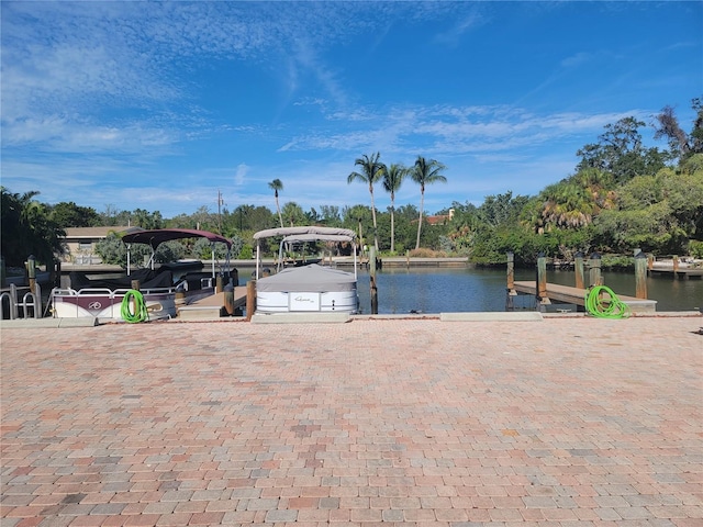 view of dock with a water view